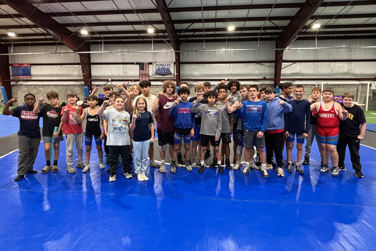 WCMS wrestling claims second region crown
