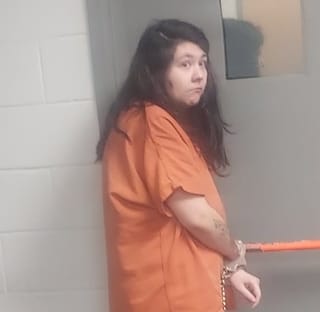 Grove bound over for domestic assault, resisting arrest