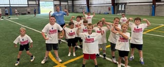 Kids flock to football camp