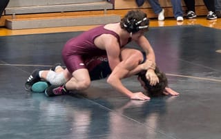 Warriors win 2 out of 3 ahead of District Duals