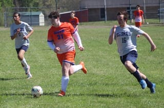 Oliver's four goals highlight win