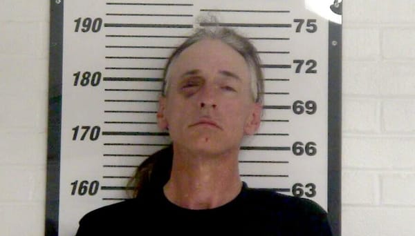 Gibbs booked on multiple charges
