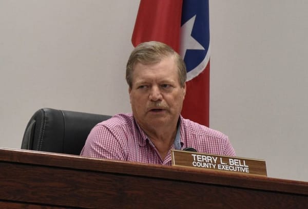 Budget passes commission including reduced tax rate