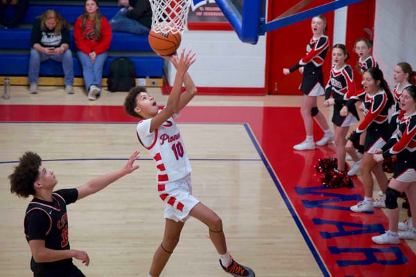 Pioneers blitz Raiders in district opener