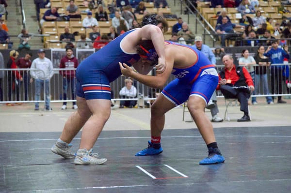 WCHS wrestling storms through season opener